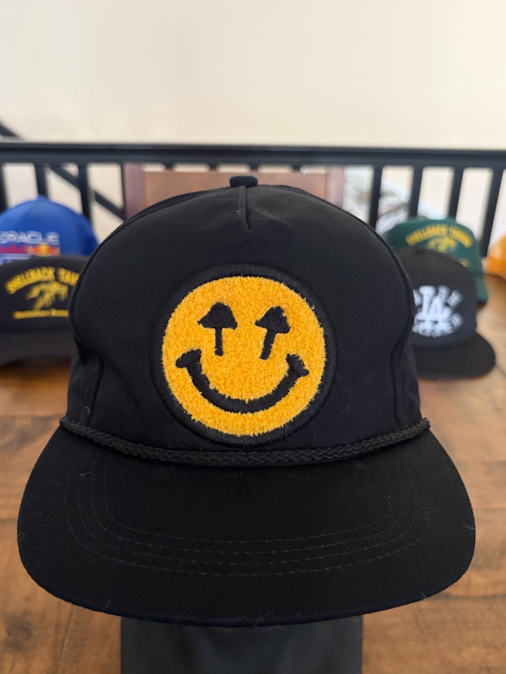 Happy Caps Black Snapback Hat with Yellow Smiley Patch